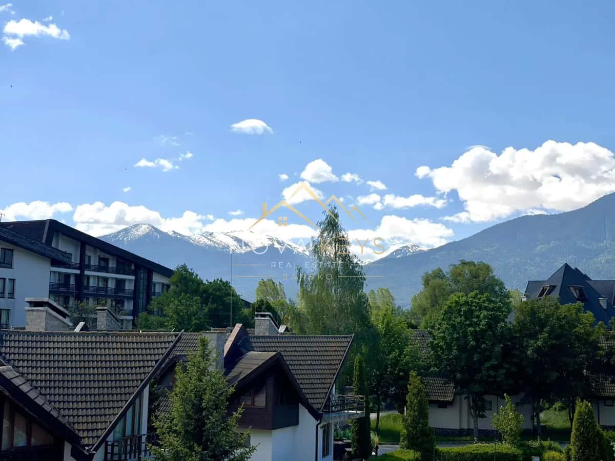 Mountain view over rooftops, two-bedroom apartment for sale in Razlog.