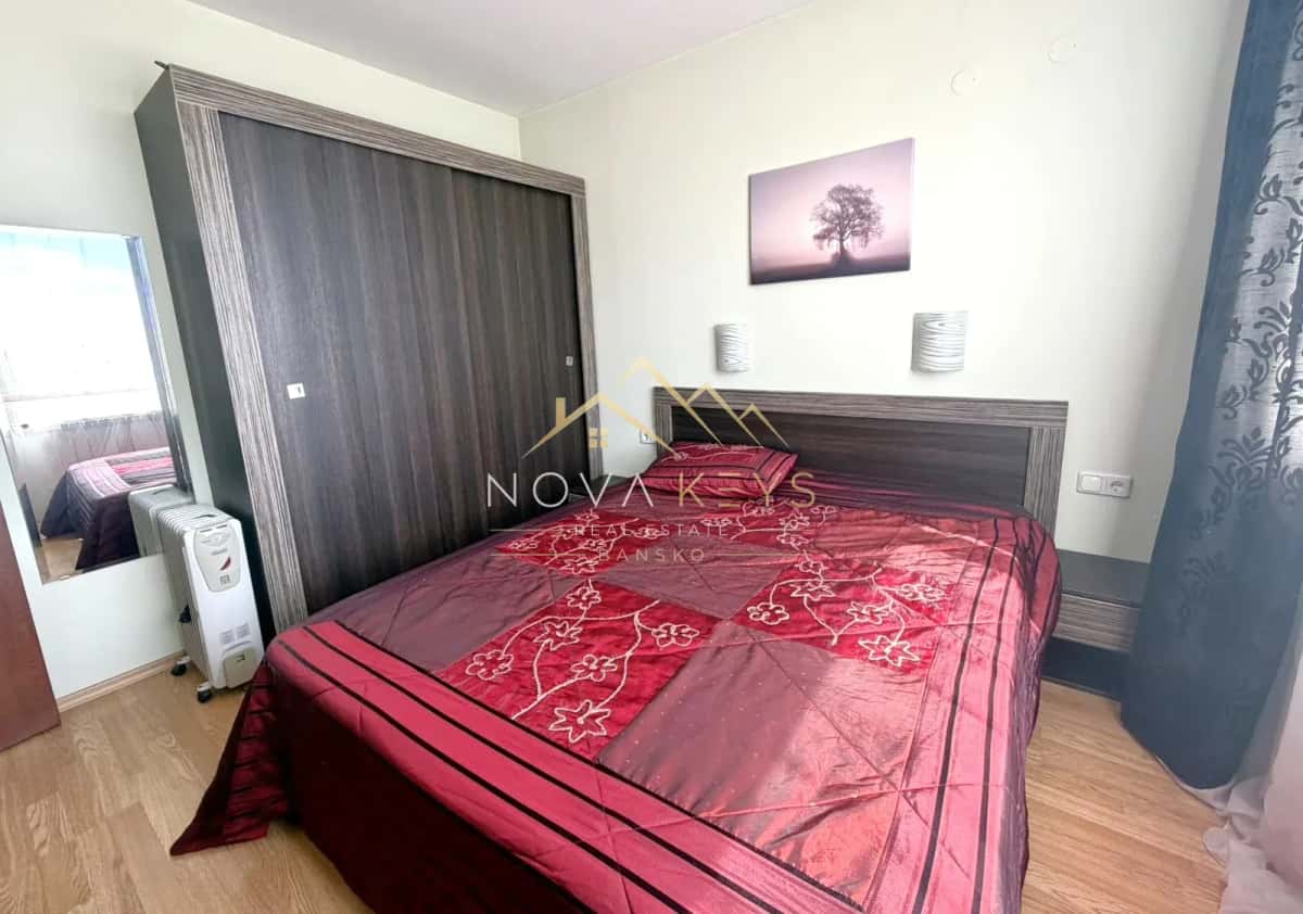 bedroom with double bed and wardrobe, two-bedroom apartment for sale in Razlog.