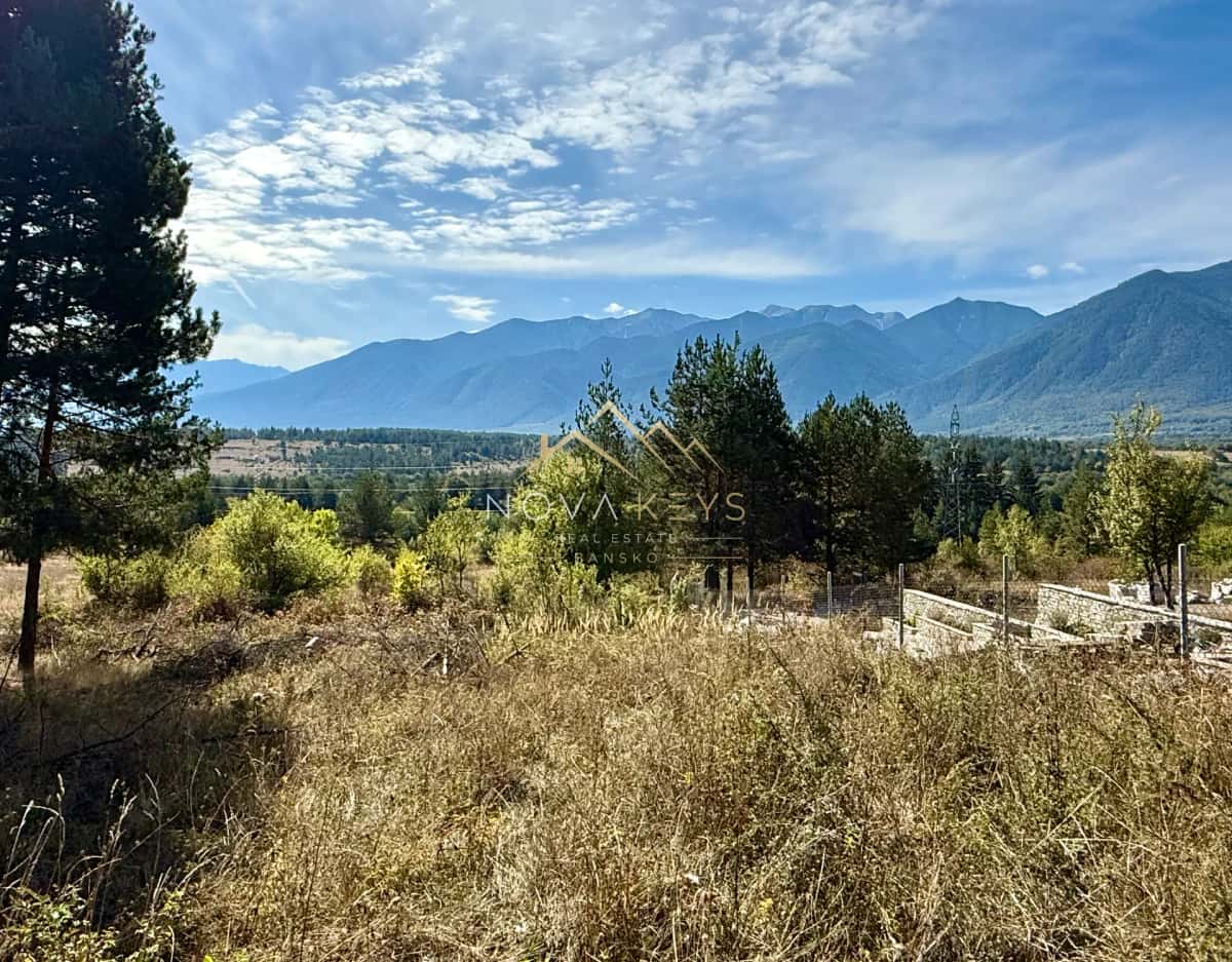 mountain landscape with grassy field, plot for sale in Razlog.