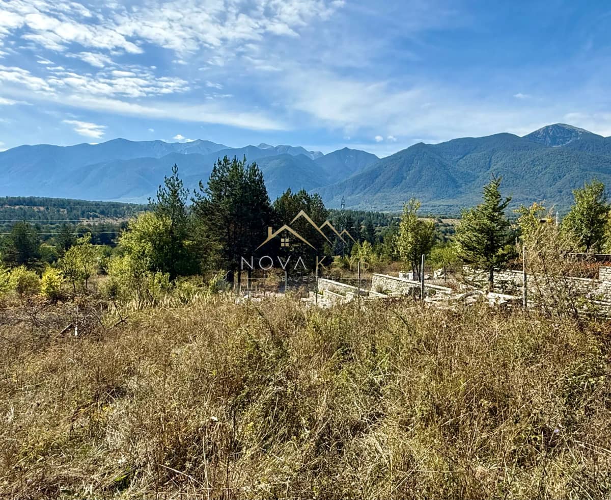 mountain landscape with grassy foreground, plot for sale in Razlog.
