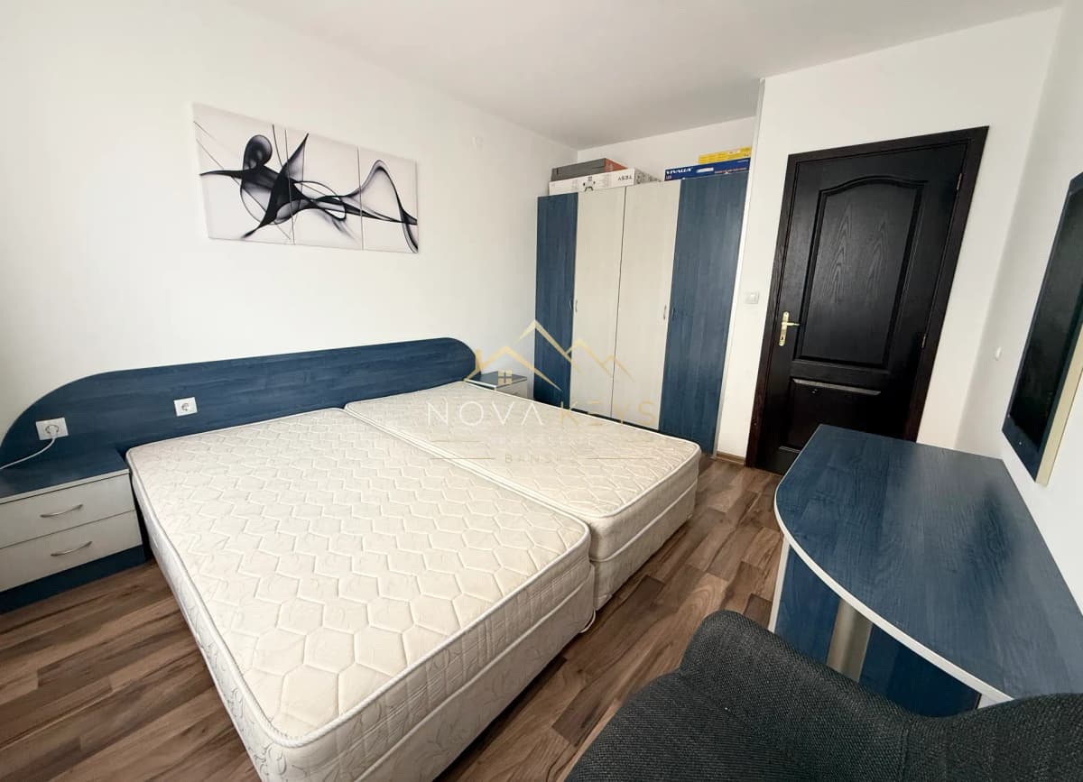Bedroom with twin mattresses and wardrobes, three-bedroom apartment for rent in Bansko centre.