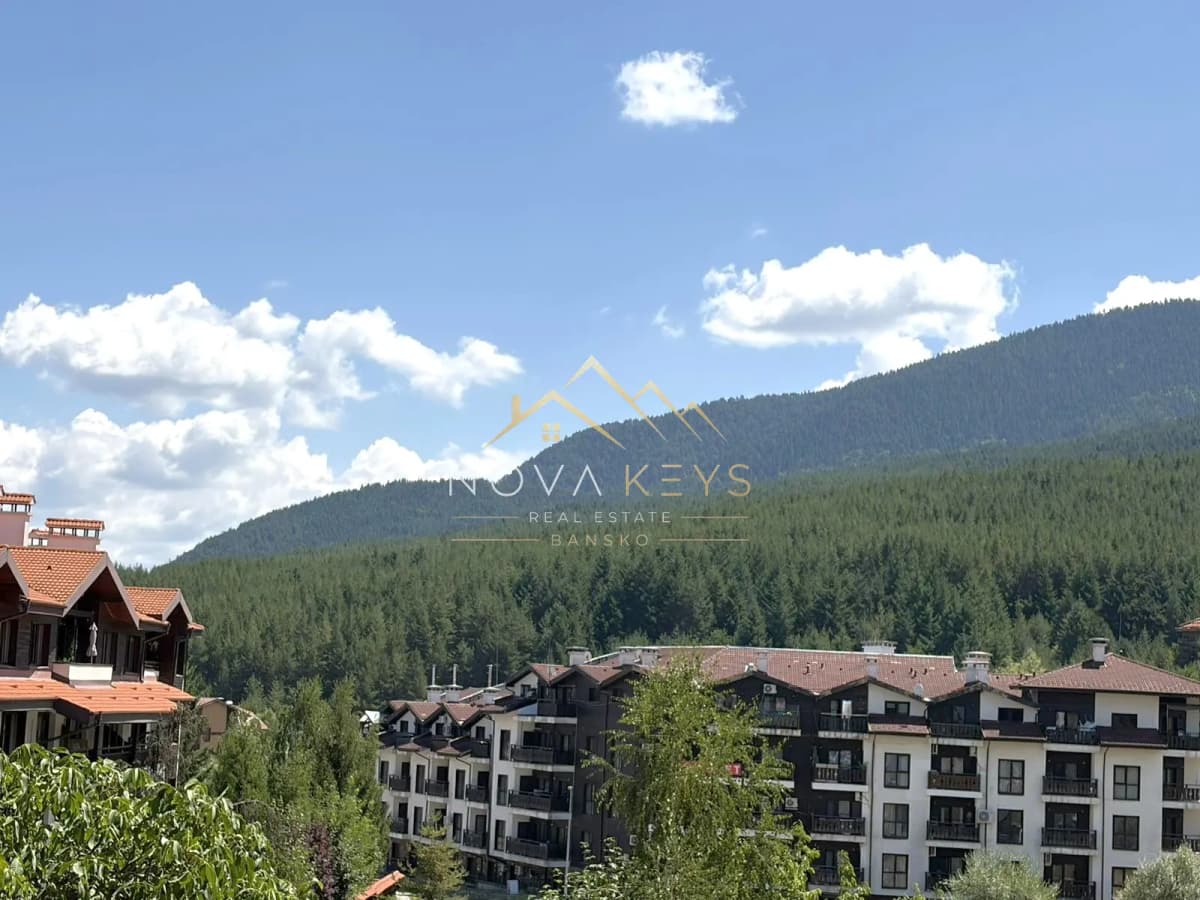 Mountain view with apartment buildings, three-bedroom apartment for sale in the Bansko ski area.