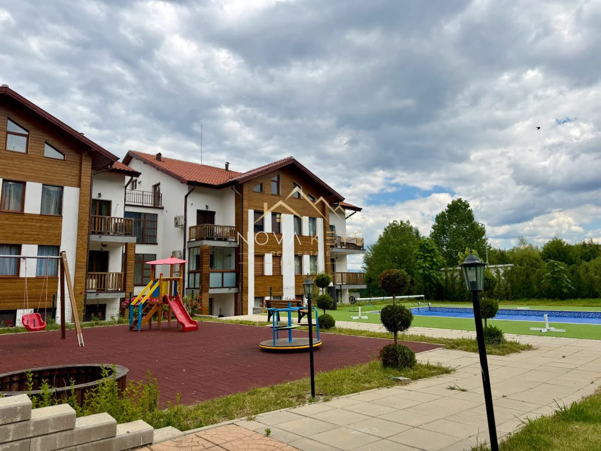 Apartment courtyard with playground and pool, two-bedroom apartment for sale in Pirin Golf.
