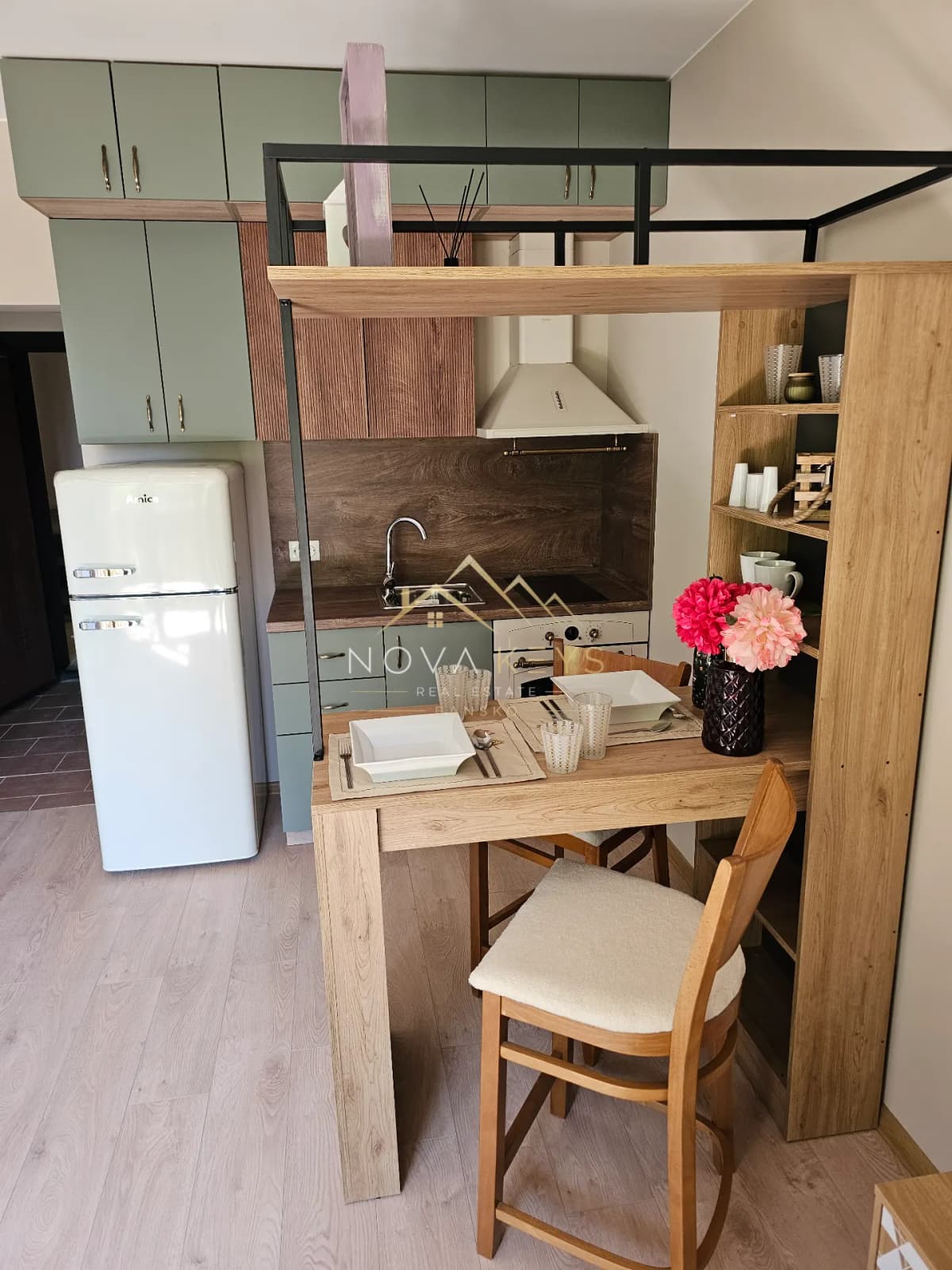 Open-plan kitchen and dining area, studio for sale in the Bansko ski area.