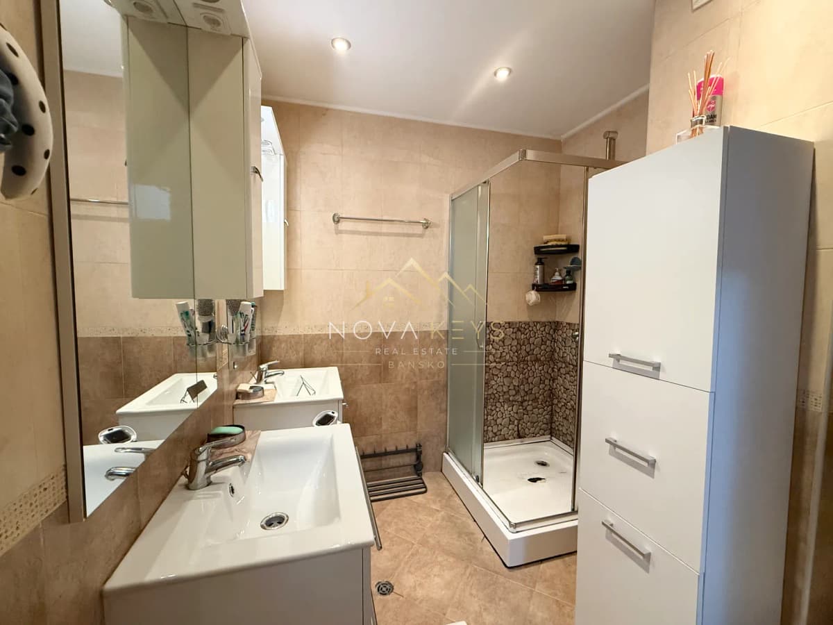 bathroom with shower and vanity sink, three-bedroom apartment for sale in Bansko.